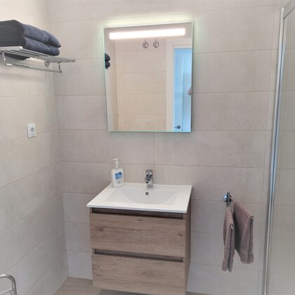 The en suite bathroom with rain shower